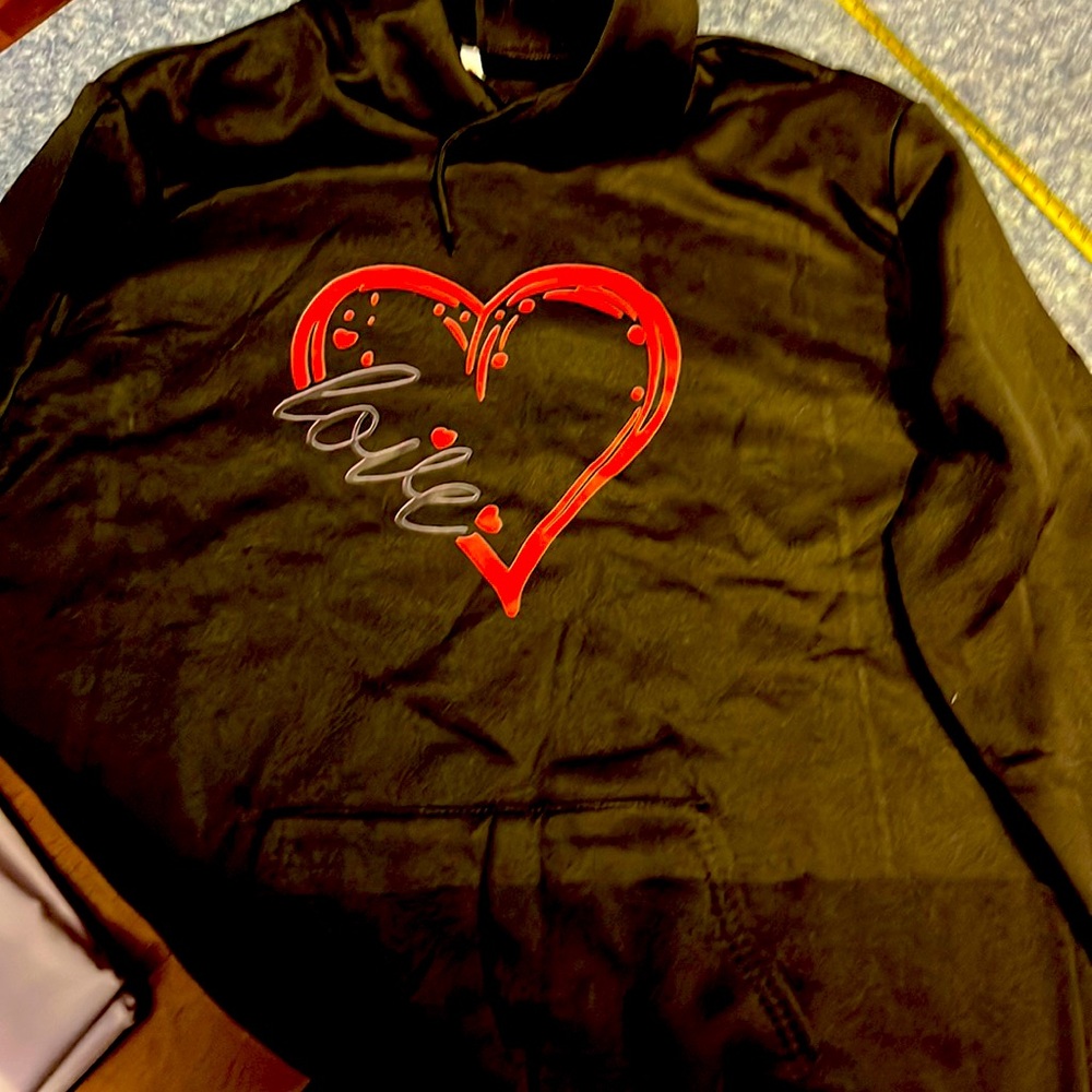 Long sleeve black sweatshirt.  Red heart & love.  2X but fits more like a large.